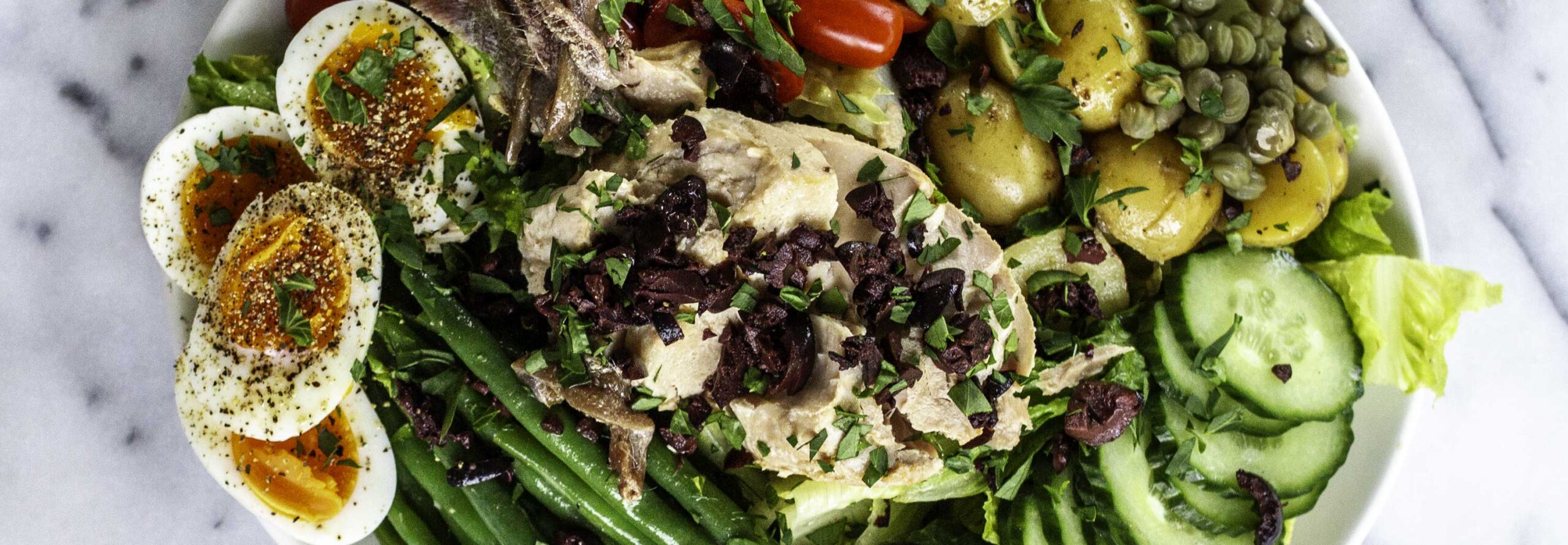 Overhead view of salade Nicoise.