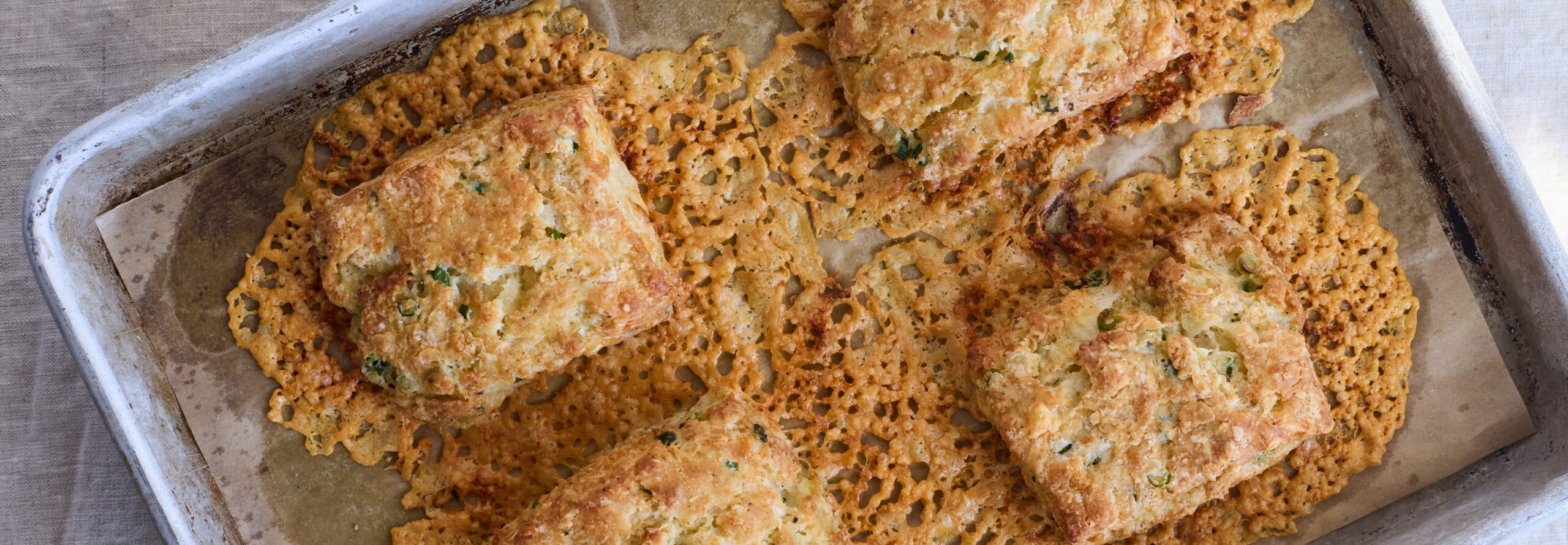 Overhead close-up of Megna's cheddar-scallion biscuits.